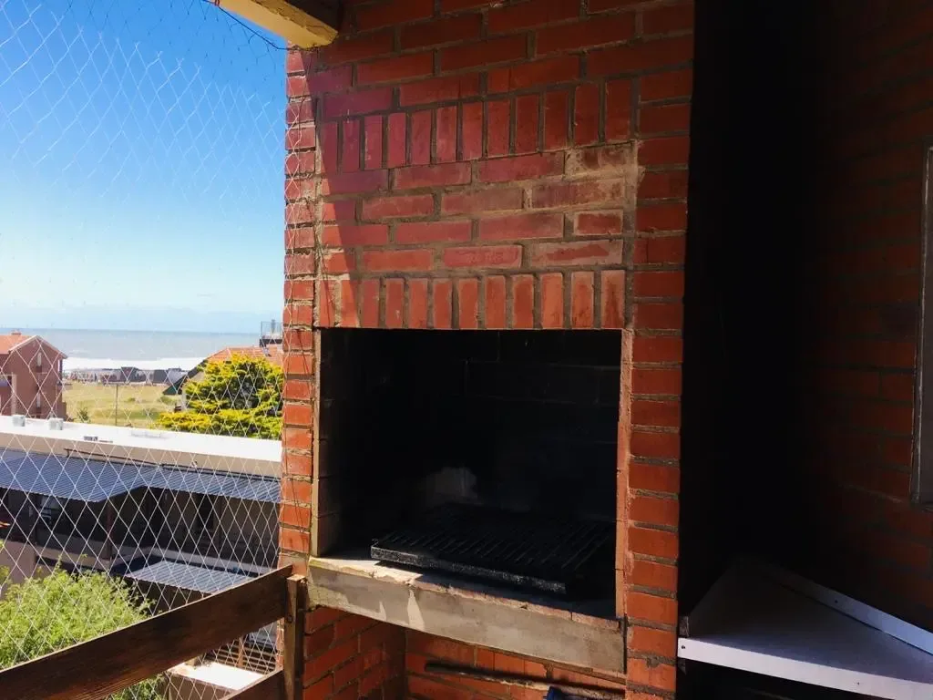 3 ambientes + playroom · Balcón al mar con parrilla